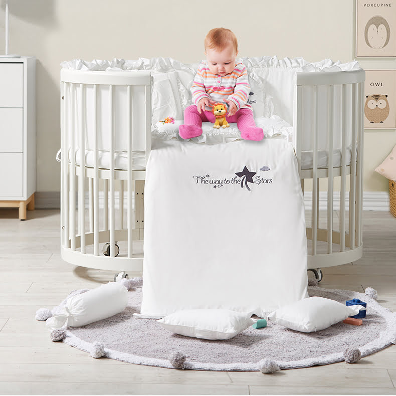 StarAndDaisy Multi-functional 6 in-1 Round Baby Wooden Cot Bed and Nursing Table with 3 Gear Height Adjustment