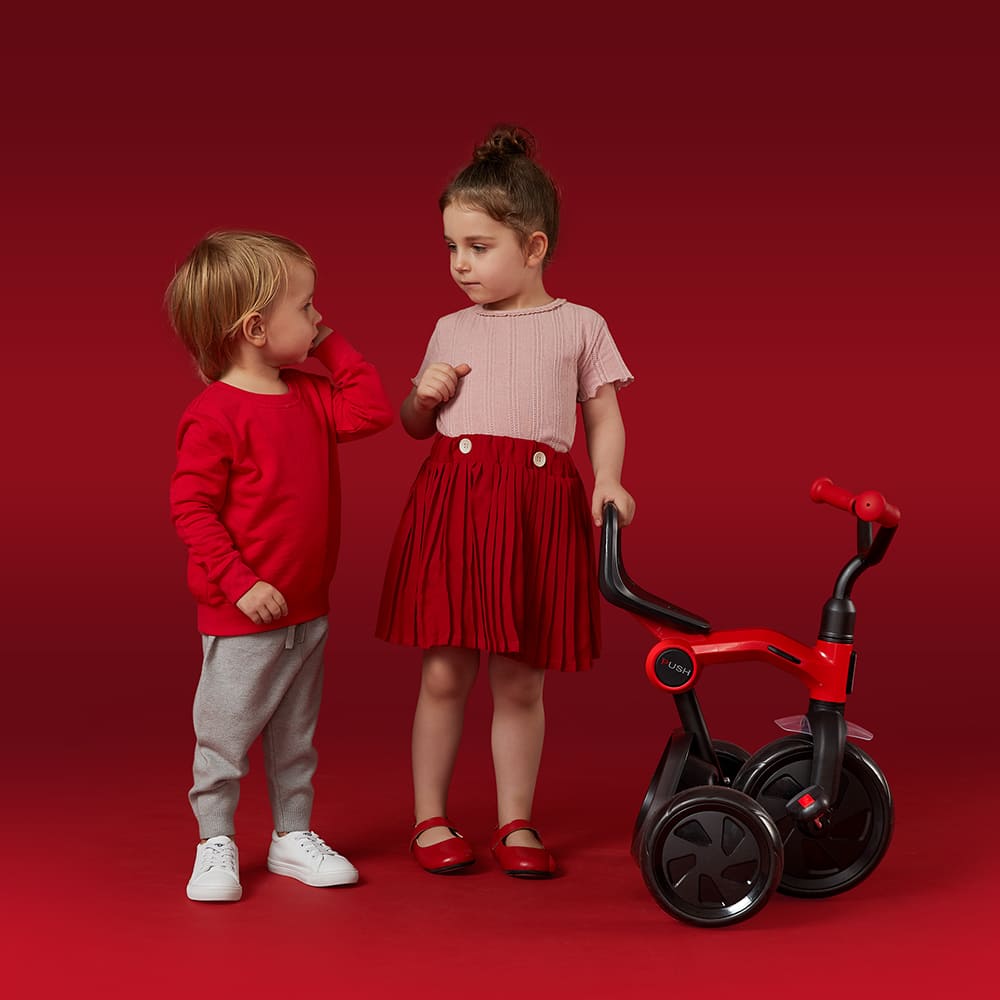 boy and girl tricycle